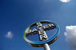 FILE - The Oct. 2, 2013 file photo shows the logo of the chemical company Bayer in Schoenefeld, Germany. The German drug and chemicals company Bayer AG confirmed Thursday, May 19, 2016 it has entered talks with the Monsanto Company about the possible acquisition of the U.S.-based specialist in genetically modified crop seeds.