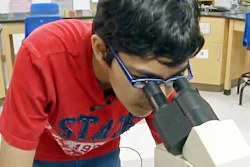 In this recent but undated frame from video provided by KOVR-TV, Tanishq Abraham, 12, looks into a microscope in a lab at American River College in Sacramento, Calif., during an interview about his recent graduation from community college and beginning his university education this fall. He's been accepted to the University of California, Davis, and UC Santa Cruz. He says he plans on studying biomedical engineering and becoming a doctor and medical researcher by the time he turns 18.