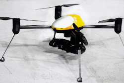 This June 24, 2014 file photo, shows a Draganflyer X4-ES drone, a professional, GPS guided, four-rotor UAV helicopter capable of autonomous flight, video and digital still images, during a demonstration in Grand Forks, N.D. A county law enforcement unit in North Dakota that has been at the leading edge of unmanned aircraft development is cleared to fly drones throughout the country.