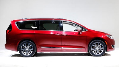 This Friday, Jan. 8, 2016, file photo, shows the 2017 Chrysler Pacifica, in Auburn Hills, Mich. Fiat Chrysler and Google announced Tuesday, May 3, 2016, that they will work together to more than double the size of Google's self-driving vehicle fleet by adding 100 Chrysler Pacifica minivans.