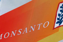This Aug. 31, 2015, file photo, shows the Monsanto logo seen at the Farm Progress Show in Decatur, Ill. Monsanto is rejecting Bayer's $62 billion takeover bid, calling it 'incomplete and financially inadequate. However, the seed company suggested Tuesday, May 24, 2016, that a higher bid might be accepted, saying that it remains open to talks.