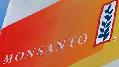 This Aug. 31, 2015, file photo, shows the Monsanto logo seen at the Farm Progress Show in Decatur, Ill. Monsanto is rejecting Bayer's $62 billion takeover bid, calling it 'incomplete and financially inadequate. However, the seed company suggested Tuesday, May 24, 2016, that a higher bid might be accepted, saying that it remains open to talks.