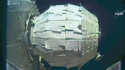 This image made from video provided by NASA shows the inflation of a new experimental room at the International Space Station on Saturday, May 28, 2016. Saturday was NASA's second shot at inflating the Bigelow Expandable Activity Module (BEAM), named for the aerospace company that created it as a precursor to moon and Mars habitats, and orbiting tourist hotels.