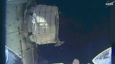 In this frame from NASA TV, a new experimental room at the International Space Station partially inflates Thursday, May 26, 2016. NASA released some air into the experimental inflatable room, but put everything on hold when problems cropped up.