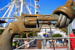 In this Tuesday, Feb. 26, 2013 file photo, a sculpture by Carl Fredrik Reutersward, titled 'knotted gun' which is a symbol designed to protest against global violence and senseless killings, is displayed in Cape Town, South Africa.