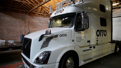 This Thursday, May 12, 2016, photo shows an Otto driverless truck at a garage in San Francisco. An 18-wheel truck barreling down the highway with 80,000 pounds of cargo and no one behind the wheel might seem reckless to most people, even in an age when a few driverless cars already are cruising some city streets. But robot-loving Anthony Levandowski is betting autonomous big rigs will be the next big thing on the road to creating a safer and saner transportation system.