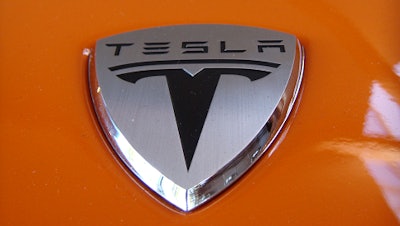 Tesla 573dc47e52a4c