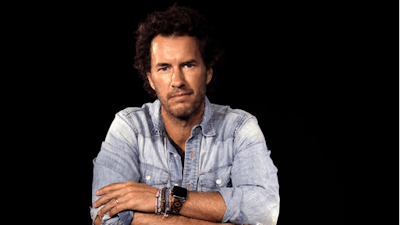 American entrepreneur, author, philanthropist and founder of Toms Shoes, Blake Mycoskie, poses during an interview in Los Angeles on Friday, May 6, 2016. Mycoskie, 39, reflects on 10 years of one-for-one giving and spoke about how he learned from his mistakes. To date, Toms has given away about 60 million pairs of shoes.