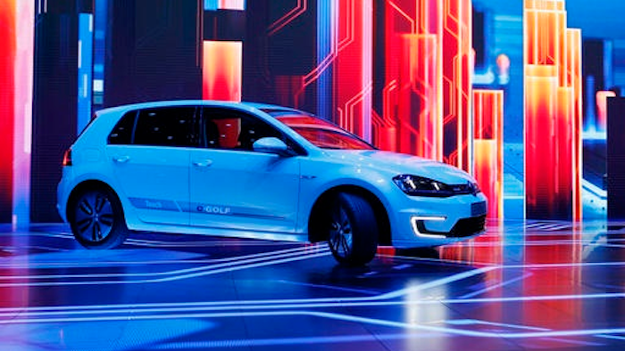 In this Jan. 5, 2016 file photo Volkswagen unveils the e-Golf Touch electric car during a keynote address at CES International in Las Vegas, United States. CEO Matthias Mueller said Thursday, June 16, 2016, the company plans to introduce more than 30 electric-powered vehicles by 2025, and to sell 2 to 3 million of them a year.
