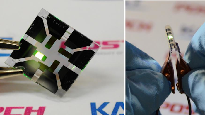 This picture shows an OLED with the composite structure of TiO2/graphene/conducting polymer electrode in operation. The OLED exhibits 40.8% of ultrahigh external quantum efficiency (EQE) and 160.3 lm/W of power efficiency. The device prepared on a plastic substrate shown in the right remains intact and operates well even after 1,000 bending cycles at a radius of curvature as small as 2.3 mm.
