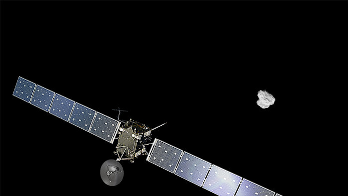 Artist impression of ESA's Rosetta approaching the comet 67P/Churyumov-Gerasimenko. The comet image was taken on August 2, 2014 by the spacecraft's navigation camera at a distance of about 500 km. The spacecraft and comet are not to scale.