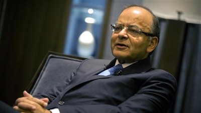 India's Finance Minister Arun Jaitley speaks during an interview in Beijing, Friday, June 24, 2016. India wants to attract manufacturing investment following its latest market-opening initiatives this week, the country's finance minister said Friday, despite business concerns about access to land, taxes and other issues.