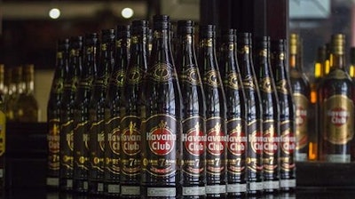 Bottles of Cuban Havana Club rum are displayed at the bar in the Rum Museum in Havana. Two liquor giants are escalating a 20-year fight to secure the rights to sell Havana Club rum in the United States when the Cuban embargo finally ends.