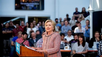 Democratic presidential candidate Hillary Clinton speaks while visiting Galvanize, a work space for technology companies, in Denver, Tuesday, June 28, 2016.