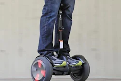 In this May 27, 2016, photo, company representative Zach Servideo demonstrates Segway's new self-balancing scooter, the MiniPro, in downtown Los Angeles. The MiniPro is going on sale on Amazon, Wednesday, June 1, 2016. Hoverboards are attempting a comeback in the U.S., months after videos showing them bursting into flame went viral.