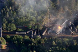 In this June 3, 2016, file photo, an oil train burns near the town of Mosier, OR after derailing. Summary