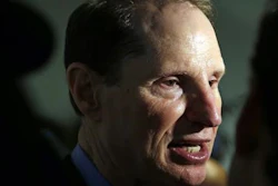 In this Friday, Sept. 25, 2015, file photo, U.S. Sen. Ron Wyden, D-Ore., speaks after a news conference in Portland, Ore. Wyden is pushing for more answers on why doctors and patient advocates with financial ties to the pharmaceutical industry came to serve on a panel that advises the federal government on pain issues.