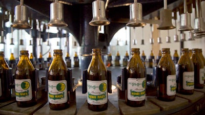 Vintage beer bottles on display at the Halve Maan Brewery in Bruges, Belgium on Thursday, May 26, 2016. The brewery has recently created a beer pipeline which will ship beer straight from the brewery to the bottling plant, two kilometers away, through underground pipes running between the two sources.