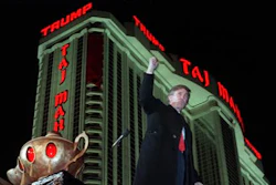 In this April 5, 1990 file photo, Donald Trump raises his fist during ceremonies for the opening the Trump Taj Mahal Casino Resort in Atlantic City, N.J. Soon after the opening, Trump owed $70 million to 253 contractors employing thousands who built the domes and minarets, put up the glass and drywall, laid the pipes and installed everything from chandeliers to bathroom fixtures. The next year, when the casino collapsed into bankruptcy, those owed the most got only 33 cents in cash for each dollar owed, with promises of another 50 cents later. It took years to get the rest, assuming the companies survived long enough to collect.