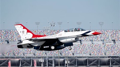This file photo taken, Feb. 18, 2016, shows U.S. Air Force Maj. Kevin Walsh and Associated Press reporter Mark Long take off in one of the U. S. Air Force Thunderbirds' F-16 aircraft in Daytona Beach, Fla. The pilots at the controls of the two F-16 jets that collided over Georgia this week are seasoned combat veterans — and so are the jets they were flying. The planes were built in 1993 and have flown hundreds of combat missions, including the fiery 2003 attack on Baghdad dubbed 'Shock and Awe,' according to commanders of the South Carolina National Guard.