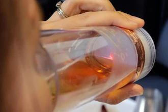 In this Wednesday, June 22, 2016, photo, the Global Ionics Beverage Power drinking device is demonstrated during a preview of products at CE Week in New York. The human body, combined with the voltage booster circuit and a single AAA battery inside the waterproof case, generates a small, safe electric current to enhance the beverage.
