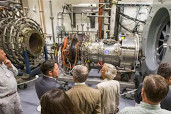 People tour the testing facilities during an open house at the Notre Dame Turbomachinery Laboratory, Tuesday, June 7, 2016, in South Bend, Ind.