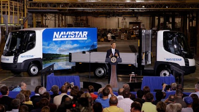This Aug. 5, 2009 file photo shows President Barack Obama as he delivers remarks on the economy in front of Navistar's all-electric commercial truck at a manufacturing plant in Wakarusa, Ind. Obama, who made his first trip as president to nearby Elkhart, Ind. will visit Concord High School in Elkhart on Wednesday, June 1, 2016.