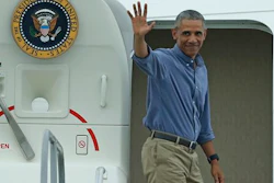 President Barack Obama waves prior to departing on Air Force One from St. Lucie County International Airport in Fort Pierce, Fla. on Sunday, June 5, 2016.