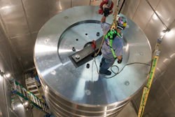 Rigging crew reassembling the million-pound weight stack in March 2016.