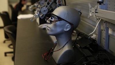 Xiaoli Zhang, an engineer at Colorado School of Mines, is developing a gaze-controlled robotic system that works in three dimensions to enable people with motor impairments to fetch objects using eye movement.
