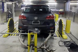 In this Oct. 13, 2015, file photo, a Volkswagen Touareg diesel is tested in the Environmental Protection Agency's cold temperature test facility in Ann Arbor, Mich. Volkswagen will spend more than $15 billion to settle consumer lawsuits and government allegations that it cheated on emissions tests in what lawyers are calling the largest auto-related class-action settlement in U.S. history. The settlement was revealed Tuesday, June 28, 2016, by a U.S. District Court in San Francisco.