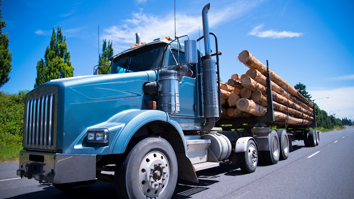Big Rig Semi Truck Carry Trees Logs On Straight Road 000076488583 Medium 1 5788fc0765f3c