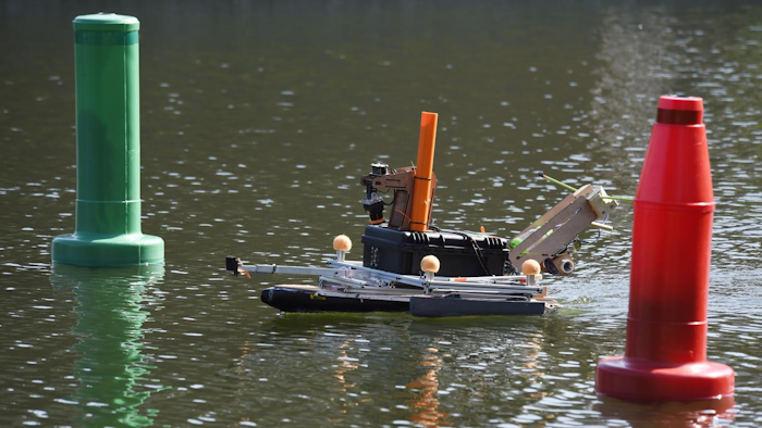 An autonomous surface vehicle from Georgia Institute of Technology, navigates an obstacle course during the 9th annual AUVSI Foundation and Office of Naval Research-sponsored International RoboBoat competition held in Virginia Beach, Virginia.