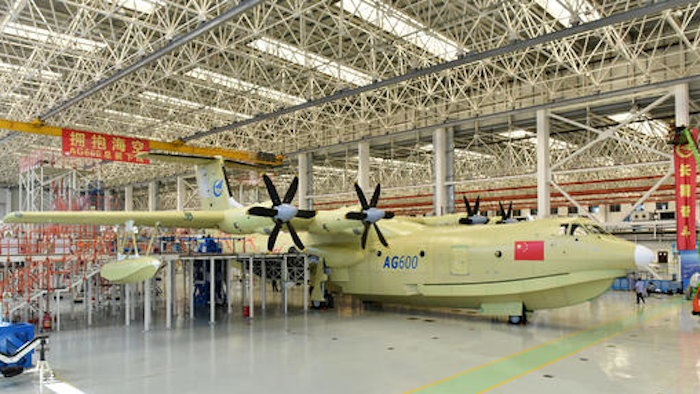 In this Saturday, July 23, 2016 photo released by Xinhua News Agency, the Amphibious aircraft AG600 rolls off a production line in Zhuhai, south China's Guangdong Province.