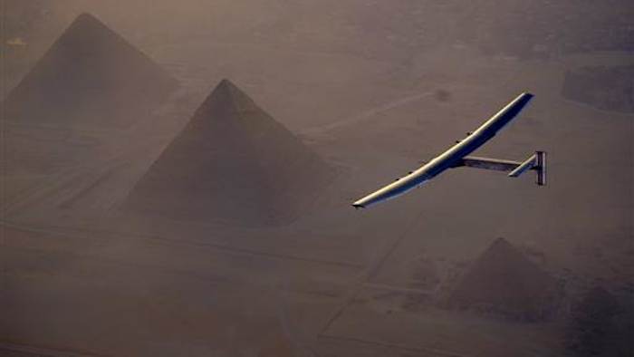 In this Wednesday, July 13, 2016, handout image provided by Solar Impulse, the Solar Impulse 2 flying over the pyramids, Egypt Cairo. The experimental solar-powered airplane has arrived in Egypt as part of its global voyage.