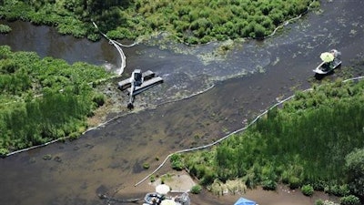 Enbridge Energy Partners will pay a massive penalty for the costliest inland oil spill in U.S. history under an agreement with federal officials.