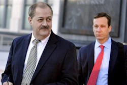 In a Tuesday, Nov. 24, 2015 file photo, former Massey Energy CEO Don Blankenship, left, walks out of the Robert C. Byrd U.S. Courthouse after the jury deliberated for a fifth full day in his trial, in Charleston, W.Va. Coal industry groups are concerned that the conviction of Blankenship could put other coal executives at risk of criminal conspiracy charges. Coal Associations from Illinois, Ohio and West Virginia shared concerns in a brief Tuesday, July 5, 2016 with the 4th U.S. Circuit Court of Appeals.
