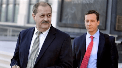 In a Tuesday, Nov. 24, 2015 file photo, former Massey Energy CEO Don Blankenship, left, walks out of the Robert C. Byrd U.S. Courthouse after the jury deliberated for a fifth full day in his trial, in Charleston, W.Va. Coal industry groups are concerned that the conviction of Blankenship could put other coal executives at risk of criminal conspiracy charges. Coal Associations from Illinois, Ohio and West Virginia shared concerns in a brief Tuesday, July 5, 2016 with the 4th U.S. Circuit Court of Appeals.