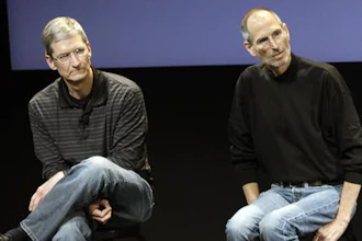 This July 16, 2010, file photo shows Apple's Tim Cook, left, and Steve Jobs, right, during a meeting at Apple in Cupertino, Calif. Apple wants to encourage millions of iPhone owners to register as organ donors through a software update that will add an easy sign-up button to the health information app that comes installed on every smartphone the company makes. CEO Cook says he hopes the new software, set for limited release in early July 2016, will help ease a critical and longstanding donor shortage. He said the problem hit home when his friend and former boss, Apple co-founder Jobs, endured an “excruciating” wait for a liver transplant in 2009.