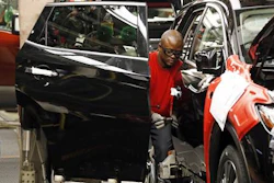 In this April 6, 2016, photograph, a technician works on a door assembly for a Nissan Altima on the line at the Nissan Canton Vehicle Assembly Plant in Canton, Miss. On Tuesday, July 5, 2016, the Commerce Department reports on U.S. factory orders for May.