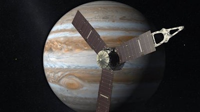 This artist's rendering provided by NASA and JPL-Caltech shows the Juno spacecraft above the planet Jupiter. Five years after its launch from Earth, Juno is scheduled to go into orbit around the gas giant on Monday, July 4, 2016.