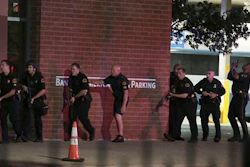 In this Thursday, July 7, 2016 file photo, Dallas police respond after shots were fired during a protest over recent fatal shootings by police in Louisiana and Minnesota, in Dallas. Police in Dallas were the first in the nation to use a robot to deliver and detonate a bomb to kill a suspect, but other law enforcement agencies are willing and able to follow suit, including some that even have trained for the day when they’d have to do so. The killing of Micah Johnson using a robot-delivered bomb ended a night of terror in which he shot 14 officers, killing five of them, and also wounded two civilians.