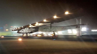 The Solar Impulse 2 plane lands in an airport in Abu Dhabi, United Arab Emirates, early Tuesday, July 26, 2016, marking the historic end of the first attempt to fly around the world without a drop of fuel, powered solely by the sun’s energy.