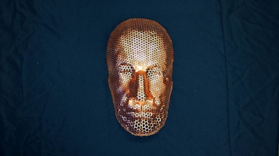 A computational design tool created a pattern of perforations that enabled a flat sheet of copper to form a 3D mask. This tool could be used to explore the possibilities of materials that stretch uniformly.