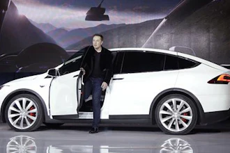 In this Sept. 29, 2015 file photo, Elon Musk, CEO of Tesla Motors Inc., introduces the Model X car at the company's headquarters in Fremont, Calif. A Tesla in Autopilot mode can drive itself but it's not a 'self-driving' vehicle, at least as far as safety regulators are concerned. So, instead of coming under heavy government scrutiny before being sold to the public, Tesla can mass-produce cars that automatically adjust speed with the flow of traffic, keep their lane and slam the brakes in an emergency.