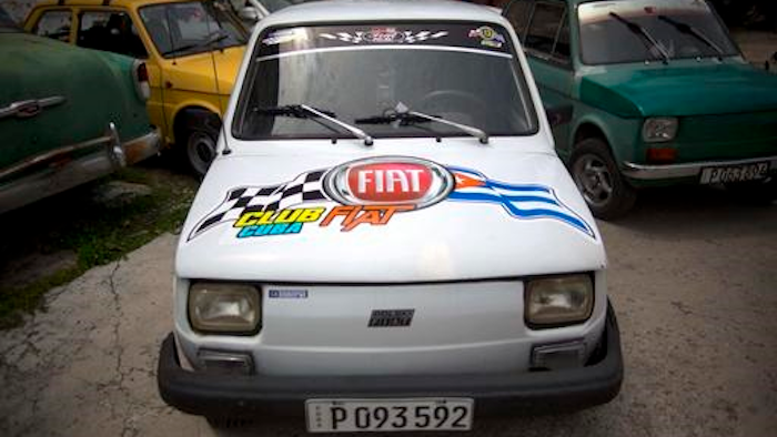 Fiat Polski 126p's from the Club Fiat Cuba, stand in a garage in Havana, Cuba, Tuesday, August 10, 2016. The half-ton, two-cylinder Polish-made hatchback, the Fiat 126p was forgotten by most people after the fall of the Berlin Wall. Decades later, the car lovingly known as the Polski is basking in a Cuban revival.