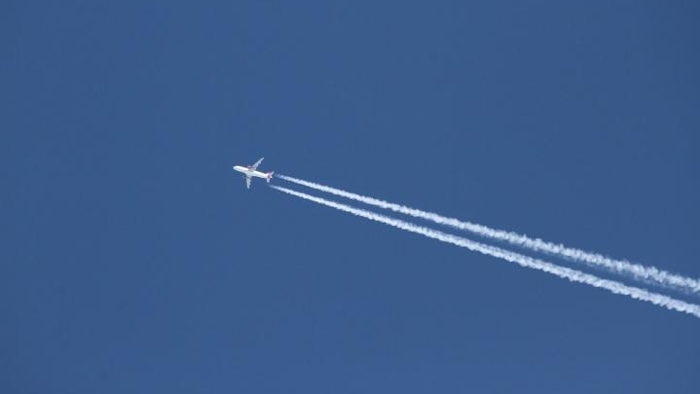This is a condensation trail, or contrail, left behind an aircraft.