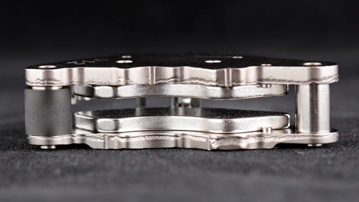 Rare earth magnet assembly recovered from a used hard drive.