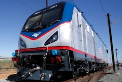 In this May 13, 2013, file photo one of the new Amtrak Cities Sprinter Locomotive makes a demonstration run during unveiling ceremonies at the Siemens Rails Systems factory in Sacramento, Calif.