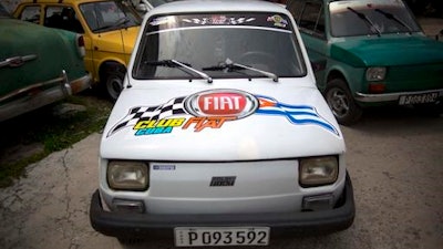 Fiat Polski 126p's from the Club Fiat Cuba, stand in a garage in Havana, Cuba, Tuesday, August 10, 2016. The half-ton, two-cylinder Polish-made hatchback, the Fiat 126p was forgotten by most people after the fall of the Berlin Wall. Decades later, the car lovingly known as the Polski is basking in a Cuban revival.